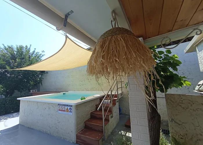 Апартаменты Wooden Summer House Mantouki